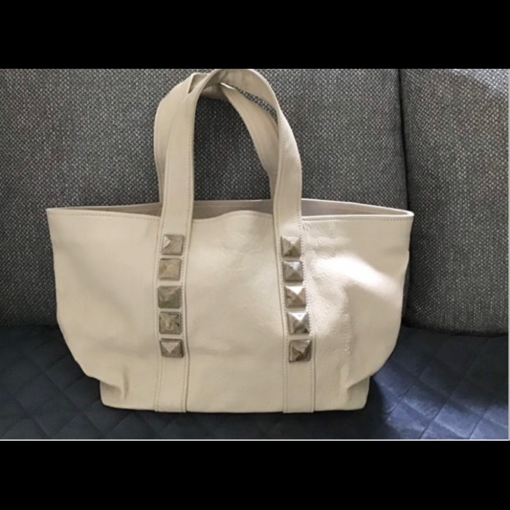 Marc Jacobs Cream Tote Bag with Silver Accents
Real leather